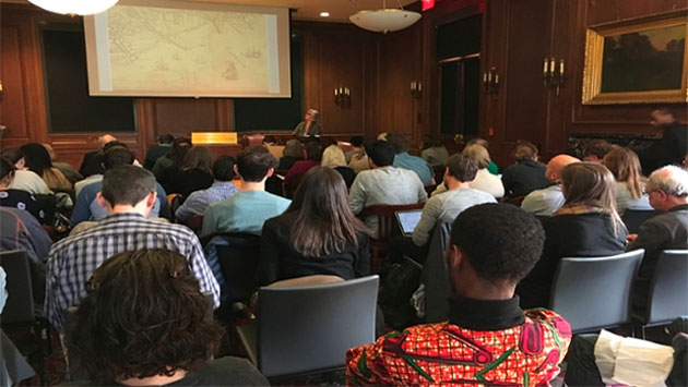 Attendees at a lecture in Harris Hall