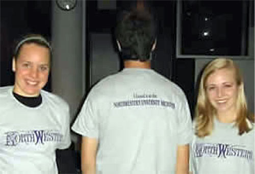 three Leopold Fellows model their new T-shirts reading 