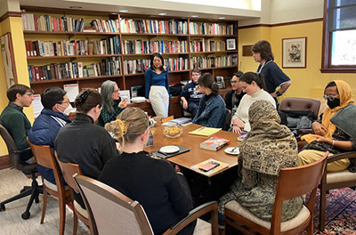 Grads meeting guest speaker Rogaski at the Center