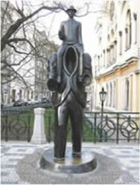 Franz Kafka monument by the sculptor Jaroslav Róna in the historic Jewish Quarter of Prague